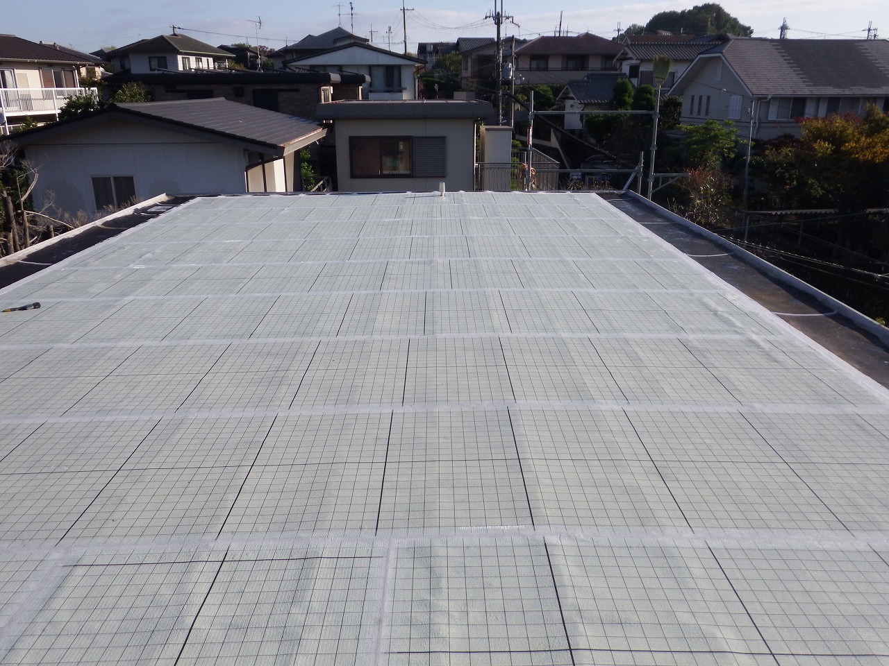 生駒市の陸屋根防水工事、通気緩衝シート設置