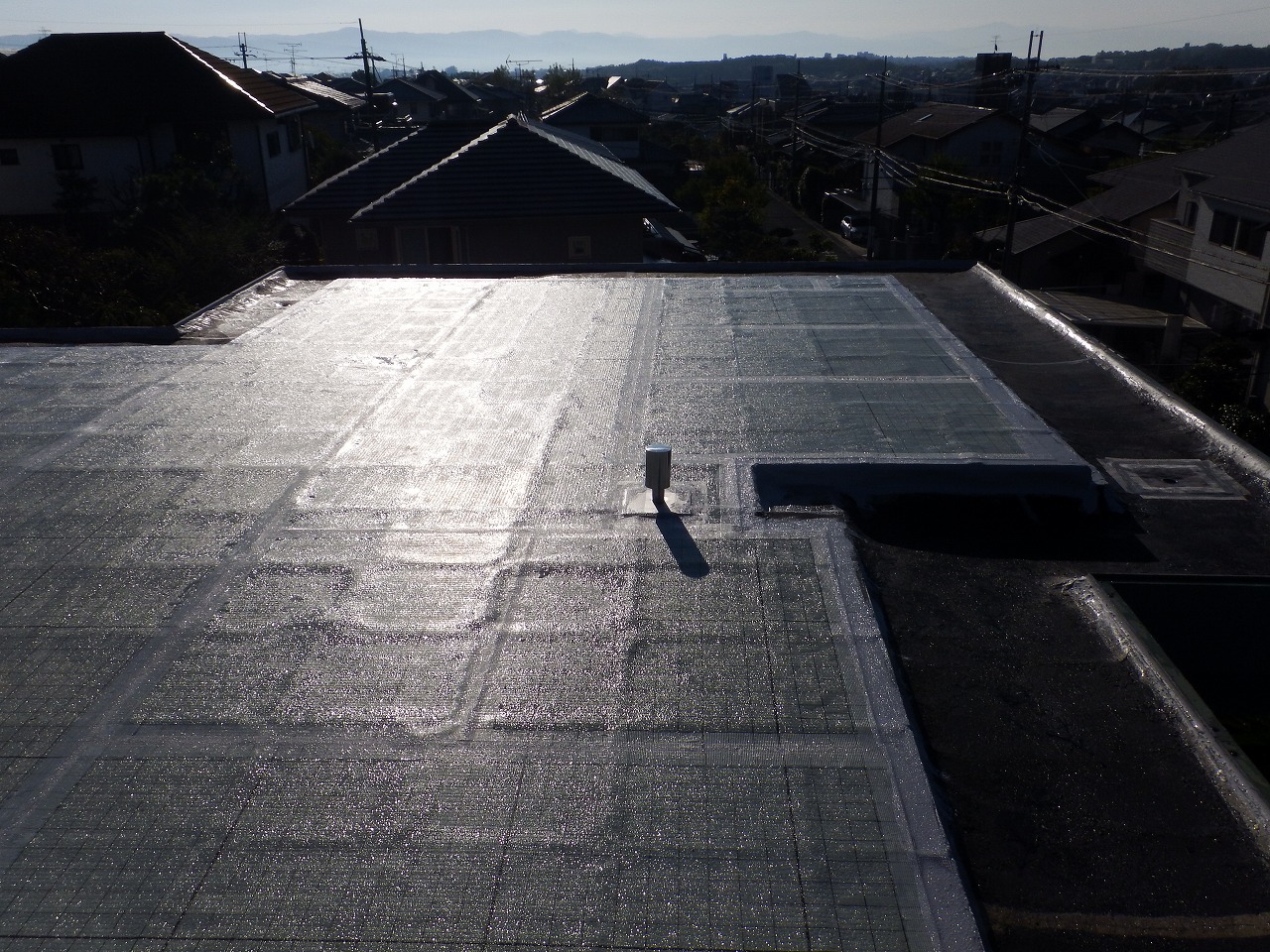 生駒市の陸屋根防水工事、シーラー塗布